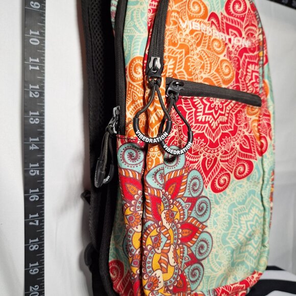 Vibedration Hydration Backpack w/o bladder turquoise/orange pattern Used main image 9